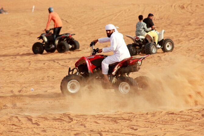 1-Hour Quad Bike Adventure: BBQ Dinner, Sandboarding & Shows! - A Break From Dubai Nightlife: Quad Bikes, BBQ, and 3 Desert Shows
