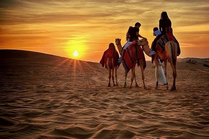 1-Hour Quad Bike Adventure: BBQ Dinner, Sandboarding & Shows! - Sandboarding and Photo Stops: Time to Slow Down (A Little)