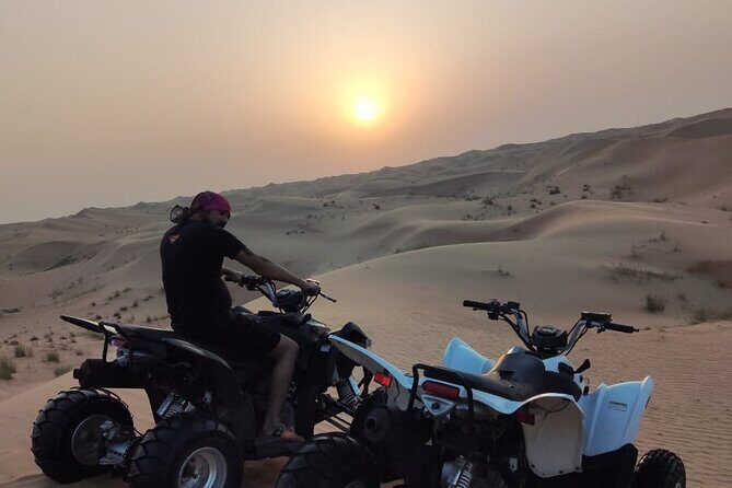 1 hour Quad Biking Experience with pick and drop - What You’ll See: Deep Desert, Farms, and Camels