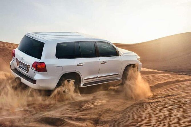 4x4 Desert Safari Dubai with BBQ Dinner & Live Shows - Sandboarding: the short ride that’s often the most fun