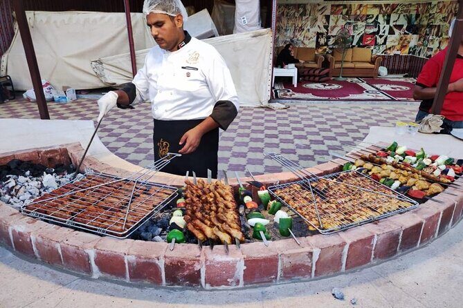 6 Hours Desert Safari Dubai Tour with BBQ Dinner & Live Shows - Sandboarding and the Quiet Moment Before the Camp