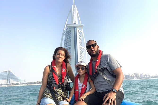 90-Min Speed Boat: Burj Al Arab, Atlantis, Ain Dubai & Ice Cream! - Dubai Marina Mall and the skyline from water-level perspective