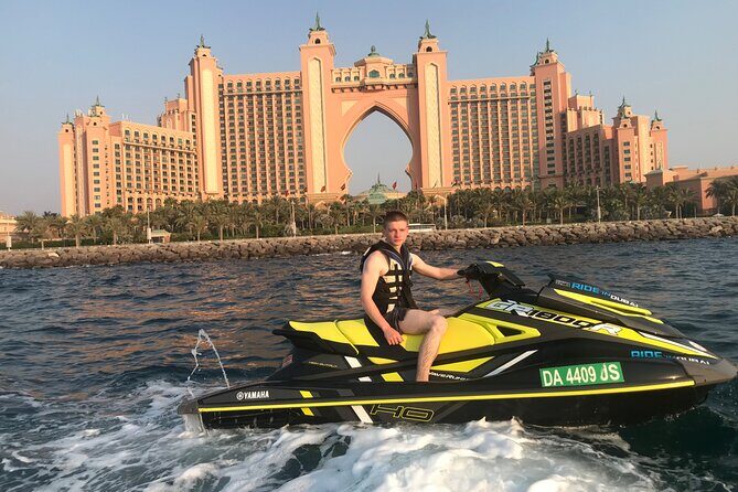 90 Minutes Dubai Palm Jumeirah Jetski Tour - Palm Jumeirah loop: close-up fronds, villa views, and the skyline on the way back