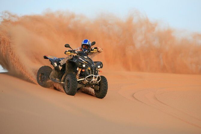 90-Minutes Quad Biking Tour From Dubai - Getting to the dunes: hotel pickup can be a win or a drag