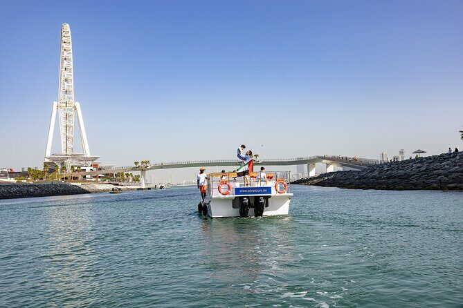 Abra Tours - Dubai Sightseeing Cruises - The Boat Experience: Modern Abra Comfort, Onboard Facilities, and Bluetooth Music
