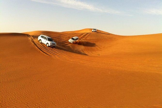 Abu Dhabi 4x4 Desert Safari BBQ Dinner , Camel Ride , Belly Dance - 4x4 Dune Bashing in Toyota Land Cruisers: Thrill With a Caution Label