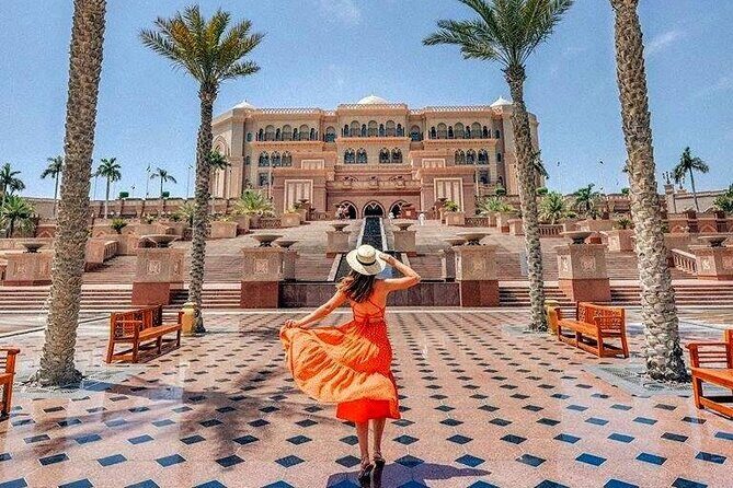 Abu Dhabi City Tour of Grand Mosque, Palace, Louvre, and Ferrari - Etihad Towers and Qasr Al Hosn: iconic looks, minimal hassle