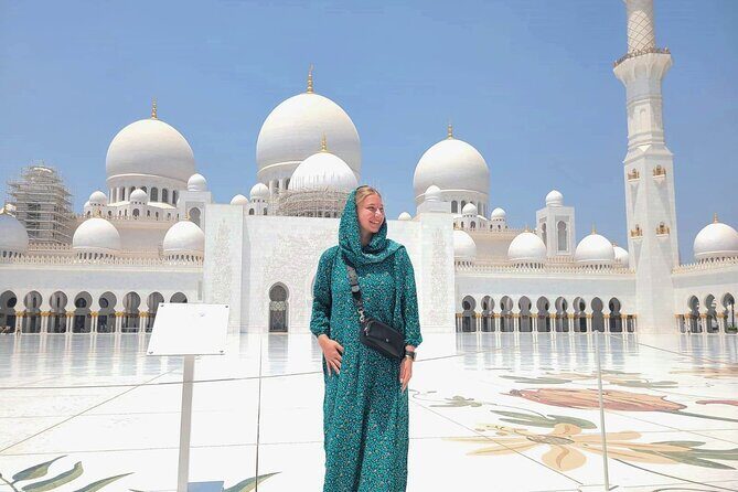 Abu Dhabi City Tour of Grand Mosque, Palace, Louvre, and Ferrari - Corniche Beach stroll and Emirates Palace: the fast scenic payoff