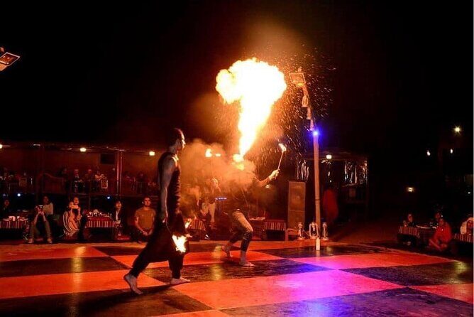 Abu Dhabi Desert Safari BBQ Dinner Live Shows Pick & Drop More - Live Shows After Dark: Belly Dance, Tanura, and Fire