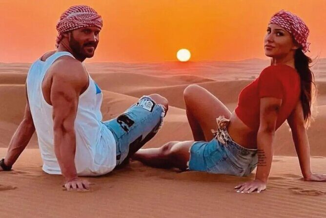 Abu Dhabi Desert Safari: Live Shows, Camel Rides & BBQ Buffet - Bedouin camp ambiance: coffee, dates, and photo costumes