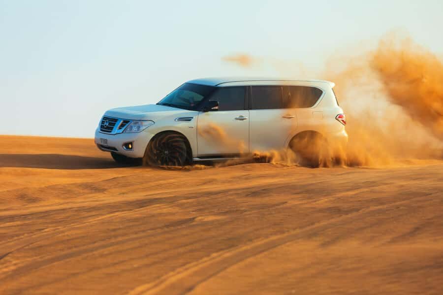 Abu Dhabi: Desert Safari, Quad Bike, Camels & Sandboarding - Pickup and the 5-hour flow (what you’ll actually feel)