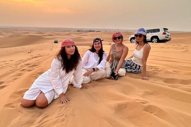 Abu Dhabi Desert Safari Tour with Shows & Buffet Dinner - The drive into the dunes: Al Ajban and the 4WD dune bashing moment