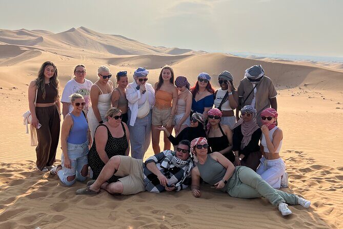 Abu Dhabi Desert Safari Tour with Shows & Buffet Dinner - Extras that cost more: quad biking, falcon photos, and scarves