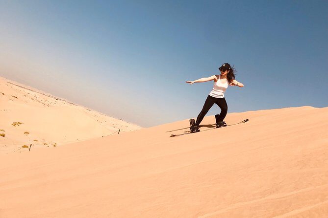 Abu Dhabi Desert safari with BBQ Dinner,Sandboarding & Camel ride - The Camp Schedule: Henna, Shisha, and Desert Night Entertainment