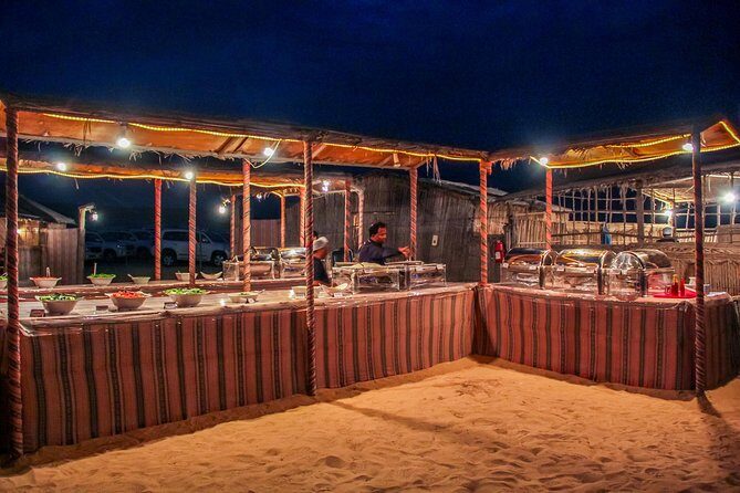Abu Dhabi Evening Desert Safari with BBQ Dinner and all Camp Activities - Torchlit BBQ Dinner and Belly Dancing at the Campfire