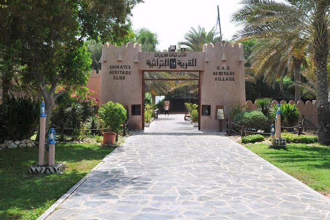 Abu Dhabi Guided City Tour With Ferrari World Tickets From Dubai - Emirates Palace and Heritage Village: luxury and Bedouin-style culture in the same day