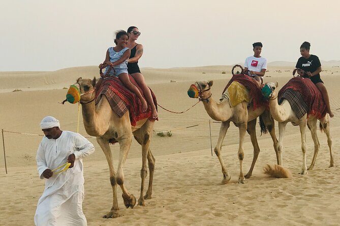 Abu Dhabi Morning Desert Safari,Dune Bashing,Sandboarding,Camel Riding&Quad Bike - Campsite Break: Camel Riding, Sandboarding, and Refreshments