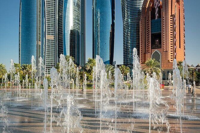 Abu Dhabi Tour From Abu Dhabi - Exhibition Centre, Etihad Towers, and Corniche Beach: the modern skyline rhythm