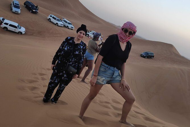 Afternoon Dune Drive Safari with SunSet Photo & Sand Boarding - Sandboarding and camel riding: included desert sports, no extra ticket