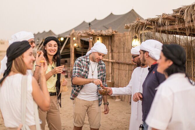 Al Marmoom Oasis Luxury Tent with Bedouin Dinner - Bedouin Village Welcome: Qahwa, Luqaimat, Dates, Then Camel Time