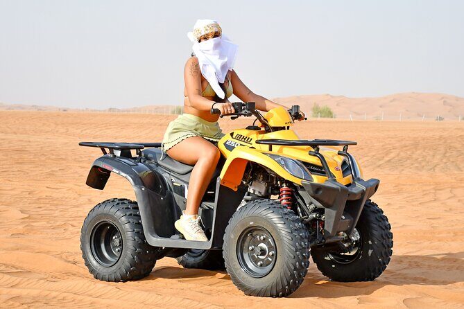 All in one Dubai Desert Safari ATV or Buggy Camelride BBQ Dinner - From Pickup to Lahbab Red Dune: the action-heavy start