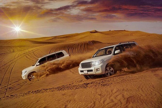 Arabian Desert Safari with BBQ Dinner Camel Ride, Sand Boarding - From hotel pickup to the Big Red Dunes