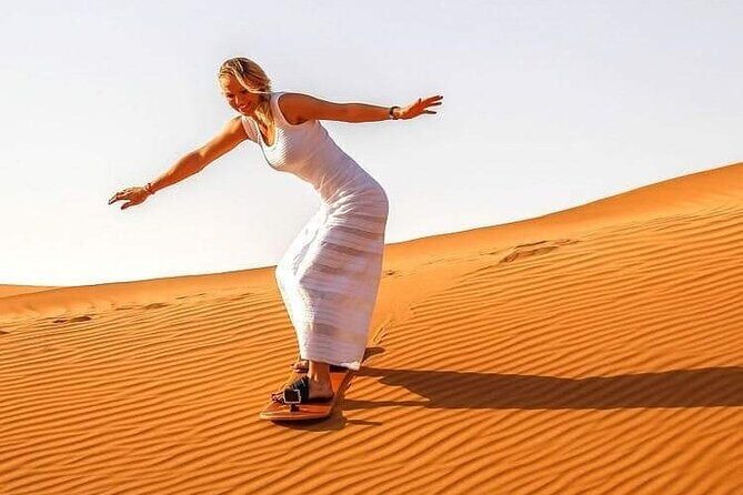 Arabian Desert Safari with BBQ Dinner & Camel Riding - The Shows: Tanoura, Fire, and Belly Dance in One Packed Program