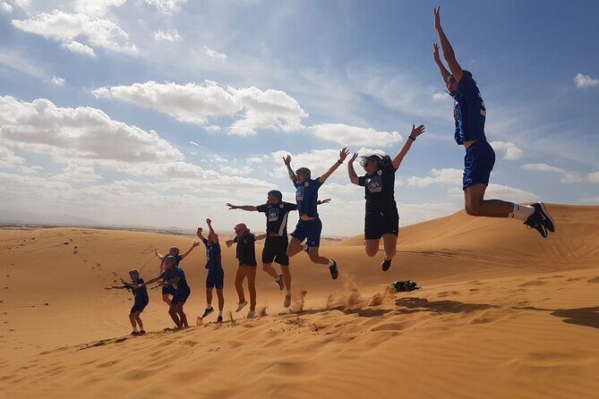 Big Red Dunes Desert Safari in Dubai with Camel Ride, Live Shows & BBQ Dinner - Live Desert Shows and BBQ Dinner: Fire, Tanura, Belly Dance Rules