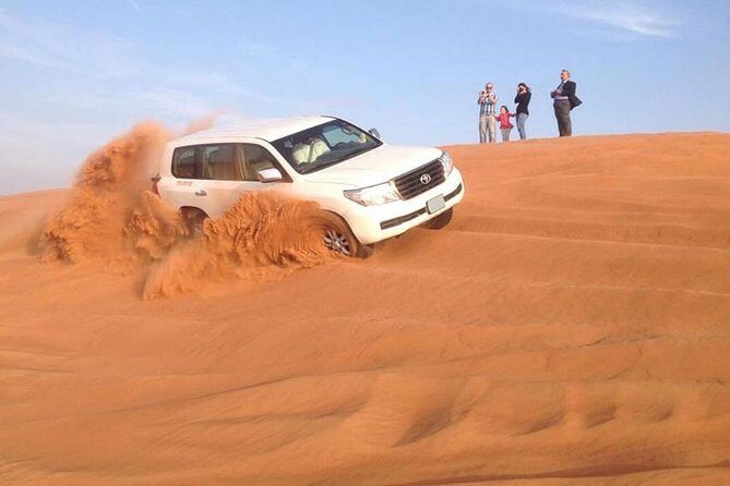 Camel Trekking and Morning Safari with Sand Boarding - High Dunes and a Sunrise Photo Stop (With a Photographer)