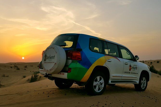 Classic Dubai Desert Safari with BBQ Dinner and Camp activities - Sunset Camp in the Desert: Camel Ride, Sandboarding, Henna