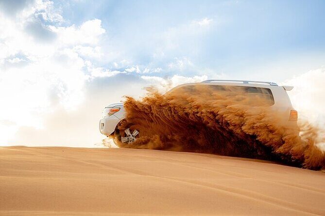 Combo Tour: Grand Mosque Visit & Dubai Desert Safari Experience - High Red Dunes safari: dune bashing and sandboarding basics