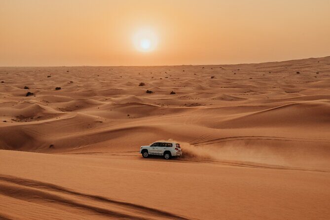 Combo:Deluxe Desert Safari with dinner + ATV self-drive/Quad Bike - Camp Arrival: Falcon Photo, Gahwa Coffee, Luqaimat, and Henna