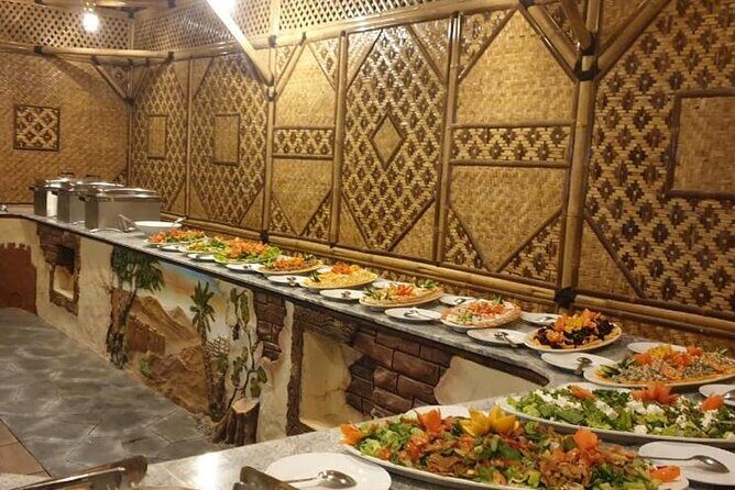 Desert Quad Biking Tour and Sand Boarding with Dinner in Dubai - Henna, Shisha, Falcon Expertise, and a Camel Ride Around Camp