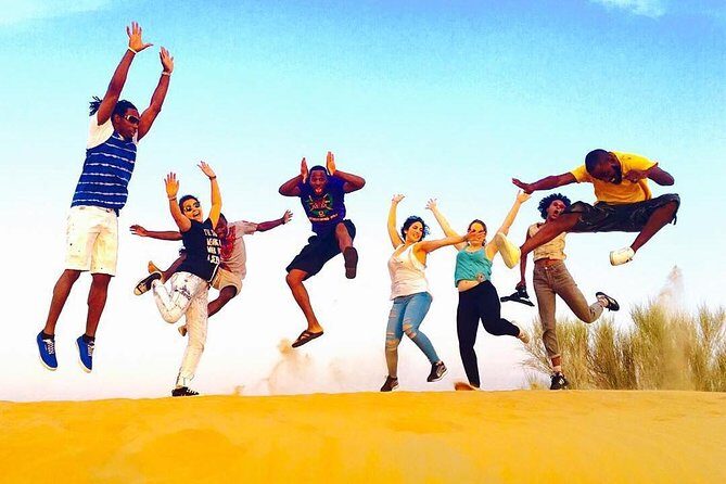 Desert Safari 4X4 Experience from Dubai - Arabic BBQ Buffet and Live Shows: Belly Dance, Tanoura, Fire