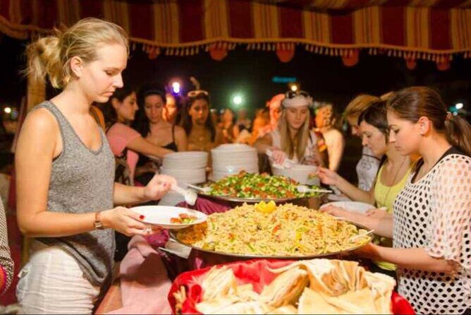 Desert Safari BBQ dinner, Camel ride & sandboarding from Dubai - Camel ride and sandboarding: first-timer friendly, not just a photo stop
