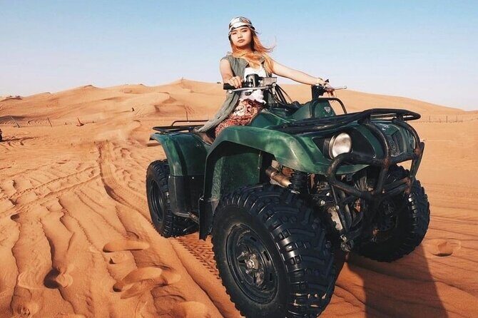 Desert Safari Dubai 25 minutes Quad Bike Free Camel Ride BBQ Dinner - The Land Cruiser dune bashing run: short, intense, memorable
