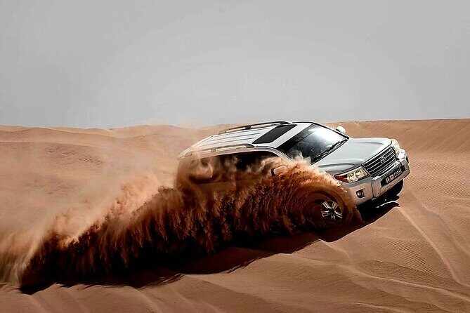 Desert Safari Dubai High Red Dunes, Camel Ride, BBQ At Camp - What you’re paying for with this $39.64 safari