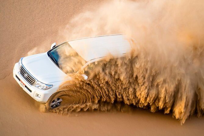Desert Safari Dubai pickup & Drop off By Land Cruiser - Dune Bashing (25–30 Minutes) and Sandboarding Fun