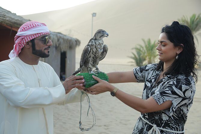 Desert Safari Dubai Sand Bashing, Camel Ride, Shows, Live BBQ - Shows at sunset and night: belly dance, Tanoura, and fire