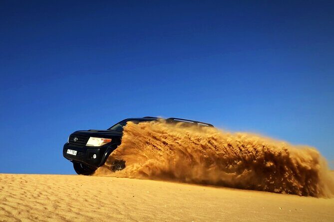 Desert Safari Dubai with BBQ - dinner, Sandboarding - Red Dunes Dune Bash And Sandboarding: Where The Fun Actually Lives