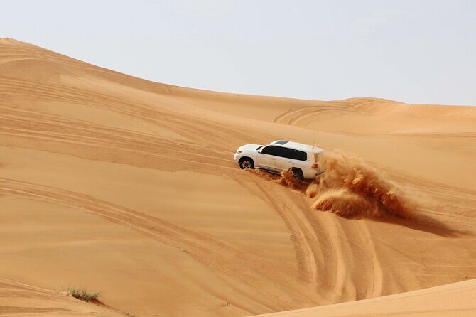 Desert Safari Dubai with Dune Bashing, Activities and Dinner - Lahbab and the main thrill: 45 minutes of red-dune bashing