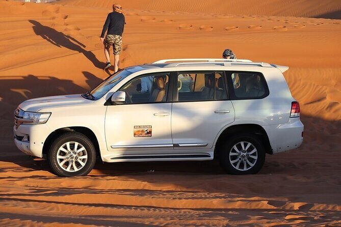 Desert Safari in Dubai Red Dunes with BBQ Dinner Private Tour - Sunset Views, Sand Boarding, and Camel Ride: Where the Fun Gets Personal