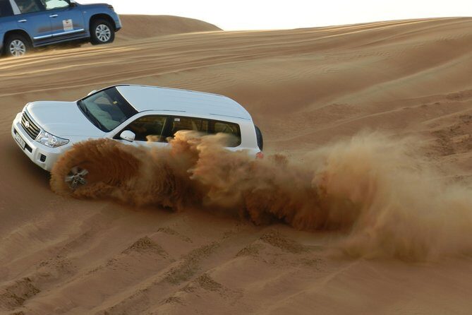 Desert safari in Dubai Red Dunes with BBQ VEG Dinner & Quad Bike - Price and What You Actually Get for $110