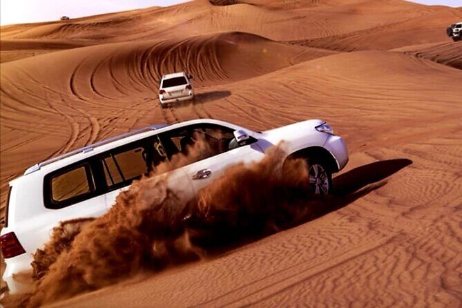 Desert Safari -Live Shows, BBQ Dinner, Dune Bashing and lot more. - Camel ride and sand-time: what to expect before the camp