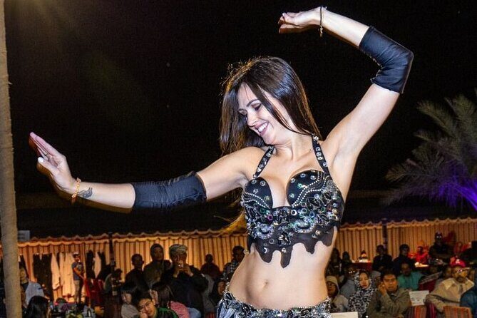 Desert Safari, Quad Biking (30 mins) & VIP BBQ Dinner Experience - Live entertainment: belly dance, Tanoura, and fire show flow