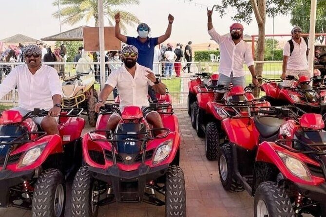 Desert Safari, Quad Biking, Sand Surfing and BBQ Dinner In Dubai - Sand surfing and dune photo stops: the sunset-ready moment