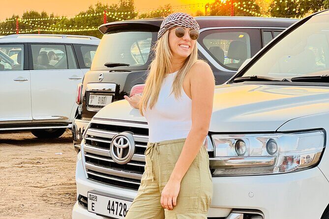 Desert Safari Small Group Tour - Dune bashing in red dunes and sand boarding basics