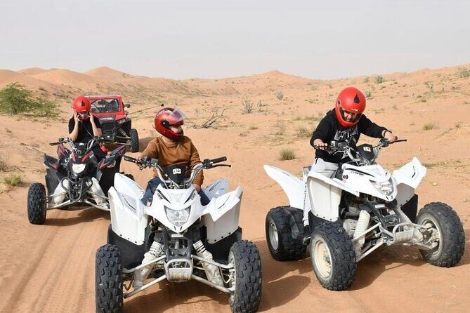 Desert Safari W/BBQ Dinner, Quad Bike, Camel Ride, & Sandboarding - From Dubai Pickup to Dune Bashing in a Land Cruiser