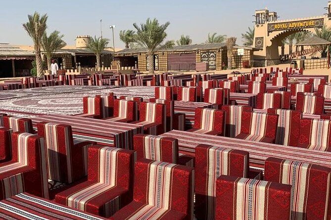 Desert Safari W/BBQ Dinner, Quad Bike, Camel Ride, & Sandboarding - Dinner at the International BBQ Buffet: Food Plus the Show Timing