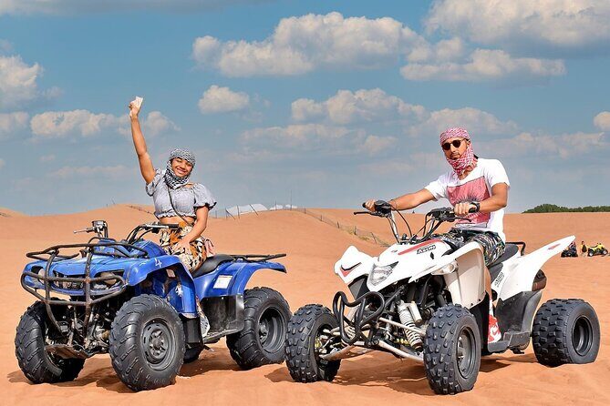 Desert Safari with 30 Minutes Quad Biking on High Red Dunes (Complete Package) - Dune bashing in a luxury 4x4: the part to take seriously